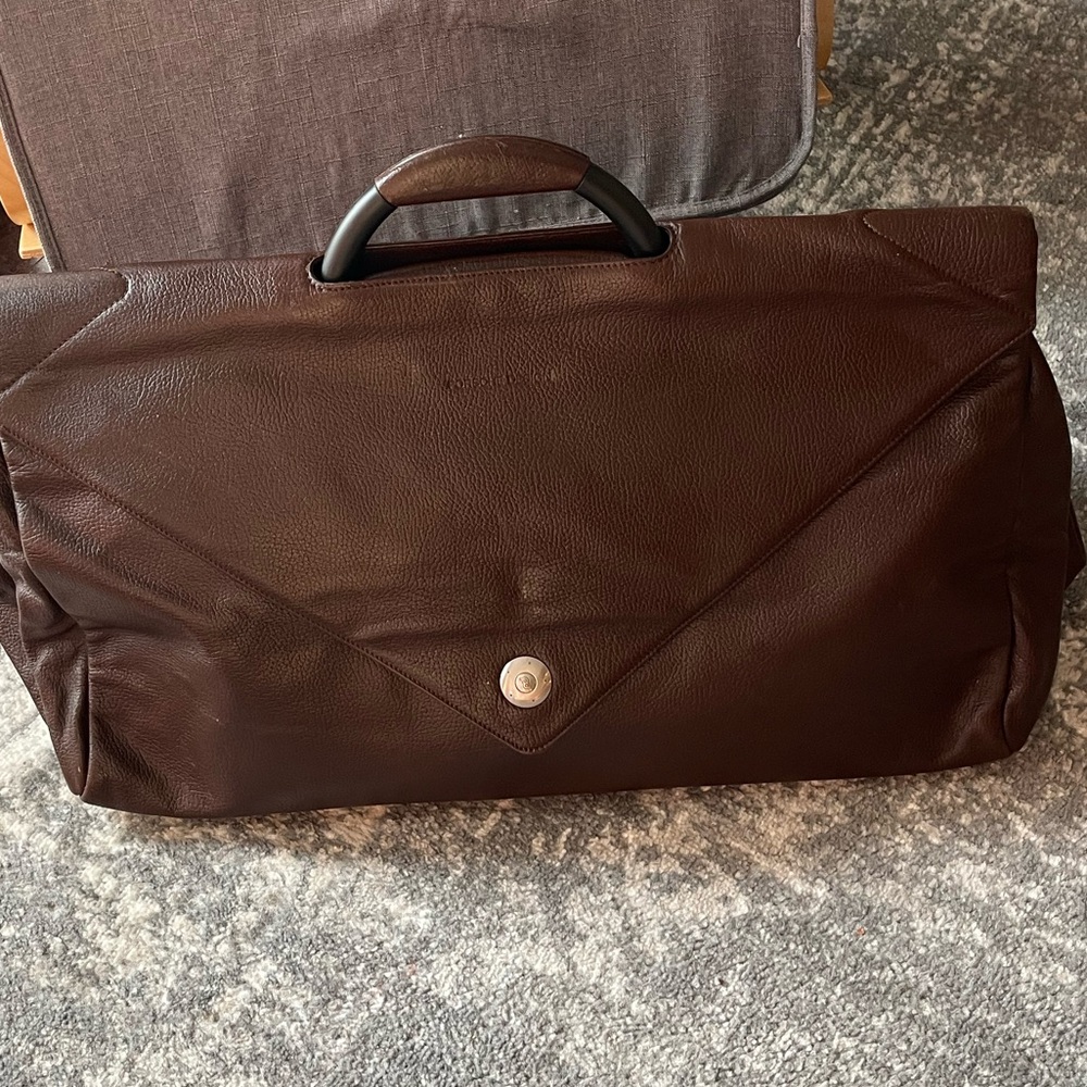 Porsche Design
Brown Leather traveling bag with Handle